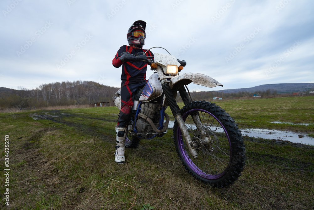 Fototapeta premium Rider starting racing in the countryside