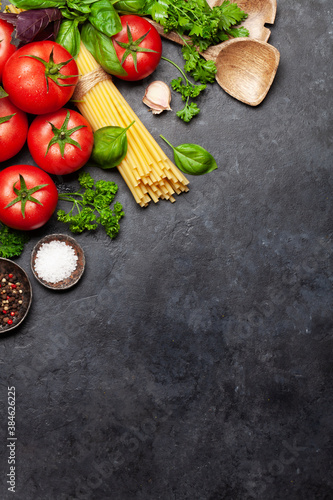 Italian cuisine ingredients. Tomatoes, pasta, herbs and spices