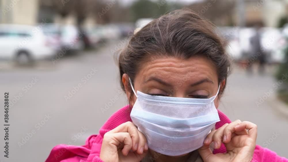 woman wearing virus protection mask woman wearing virus protection mask