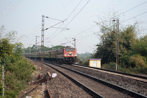  Khirai Midnapore, West Bengal, India - 11th October 2020 : a passenger train of Indian Railway accelerating.