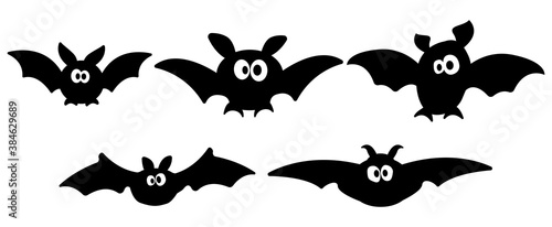 Funny bats set. Vector. Black cartoonish bats.