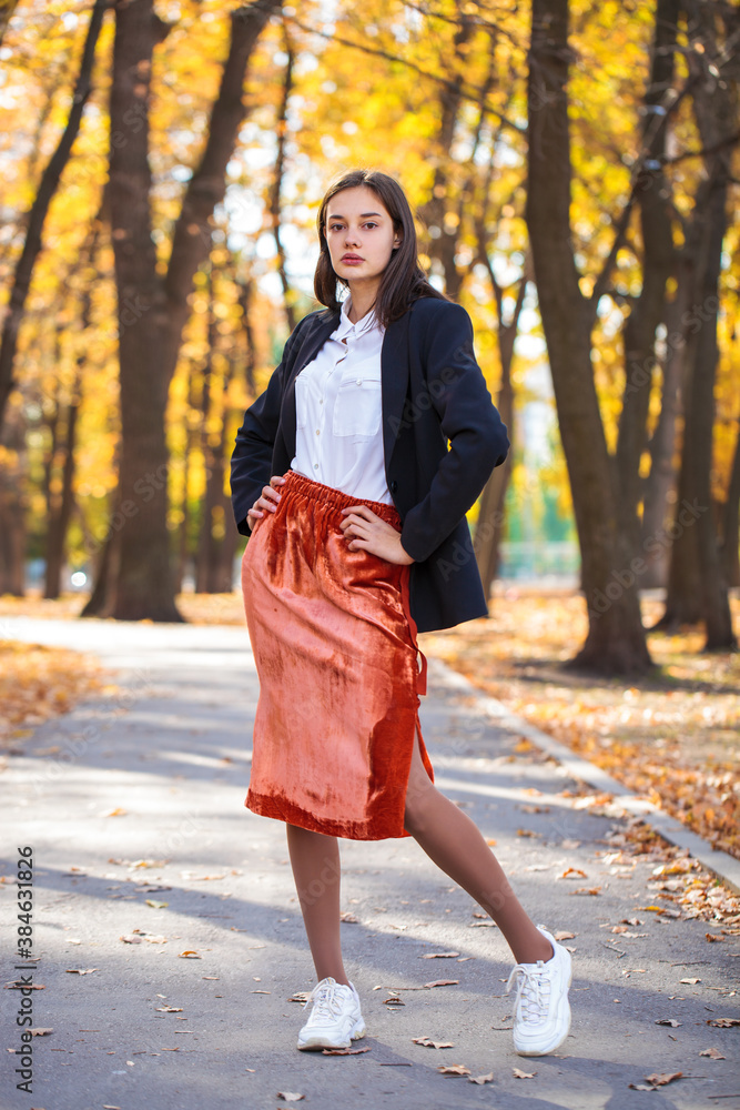 Full body portrait of a young brunette girl