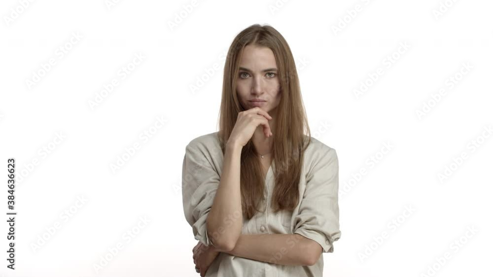 Video of thoughtful blond woman in casual blouse, thinking and trying figure something out, shrugging clueless, dont know what to do, standing over white background Video of thoughtful blond woman in casual blouse, thinking and trying figure something out, shrugging clueless, dont know what to do, standing over white background