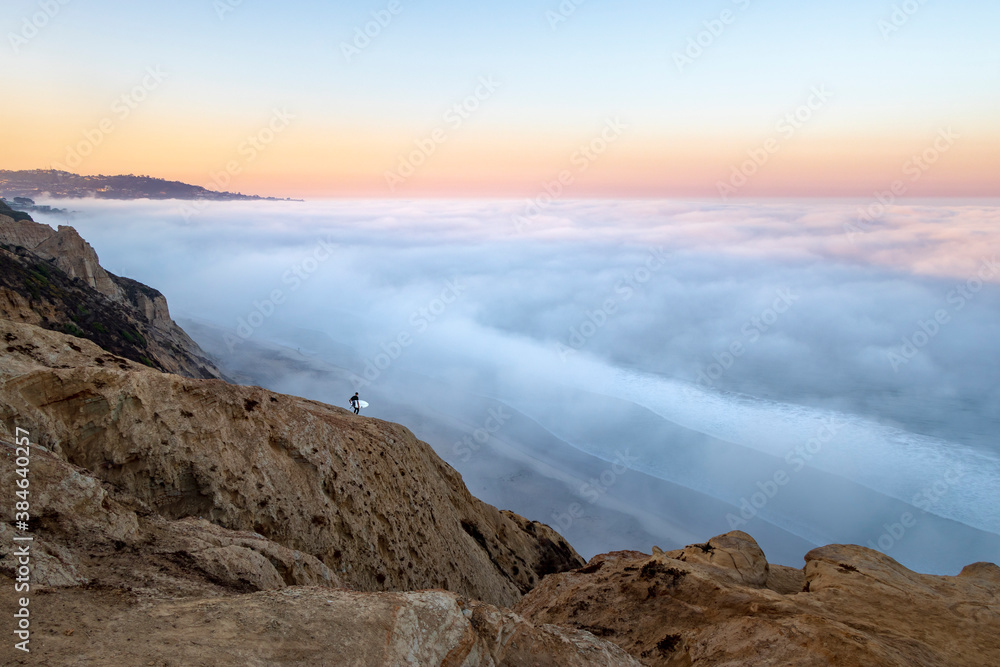 Surfer Above the Clouds in San Diego