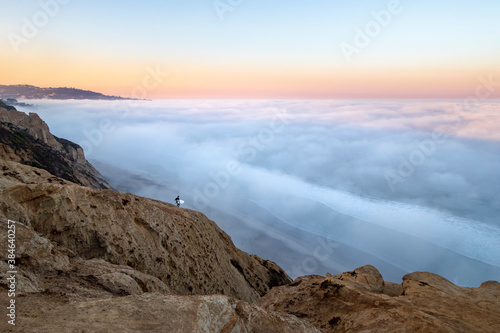 Surfer Above the Clouds in San Diego