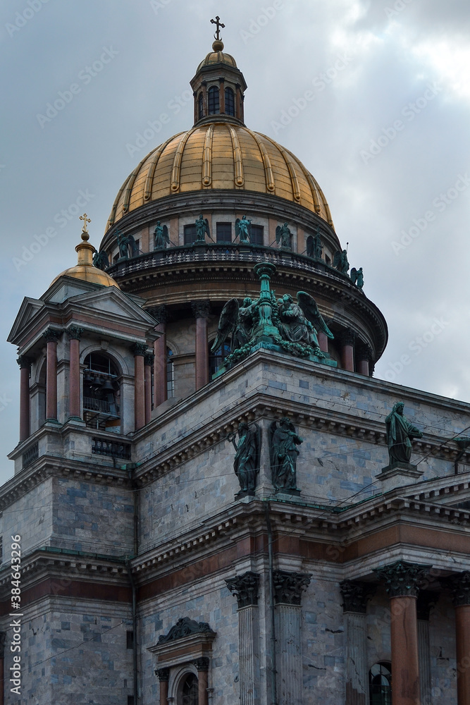 Isaac's Cathedral, Saint Petersburg, Russia, 11.10.2020. Historic building in style of classicism. Facade, exterior with green sculpture, statues and relief. Gold dome