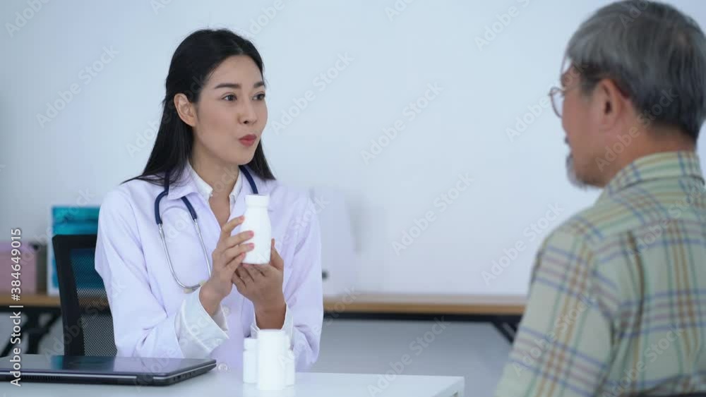 Woman doctor recommend drugs to patients sitting at desk in hospital Woman doctor recommend drugs to patients sitting at desk in hospital