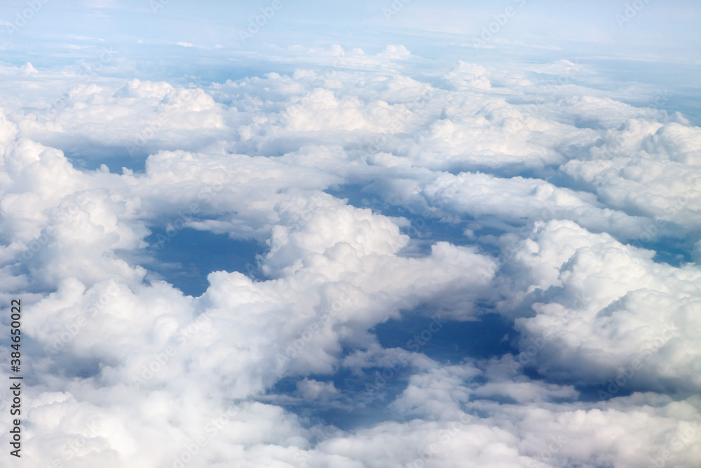 Fabulous, white clouds and blue sky. View from the airplane window. Fabulous, white clouds and blue sky. View from the airplane window.