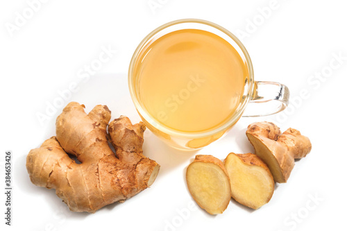 Ginger ale in cup and Ginger sliced on white background.Nature organic herb healthy.