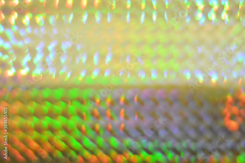 Holographic foil pattern. Colorful hologram surface