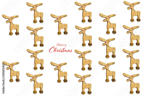 Merry Christmas card. Vintage Christmas reindeer toy isolated on white background
