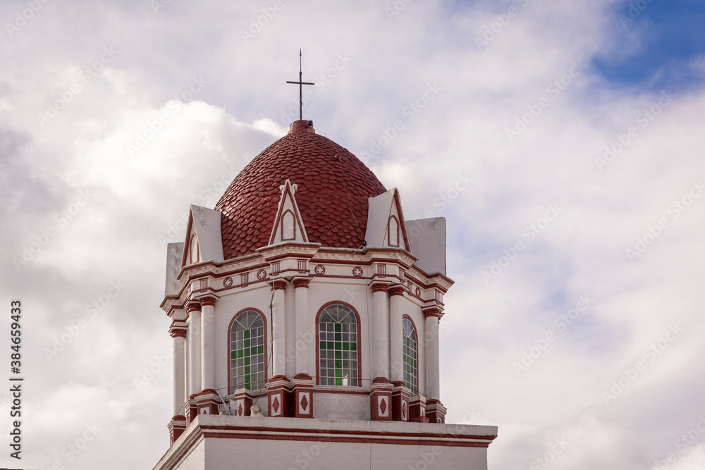 Guatape, Antioquia / Colombia. May 3, 2019. The Church of Our Lady of Carmen in Guatapé Colombia is a Greco-Roman style church