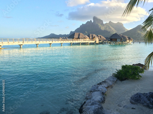 Sun Rising Over Pier with View of Mount Otemanu