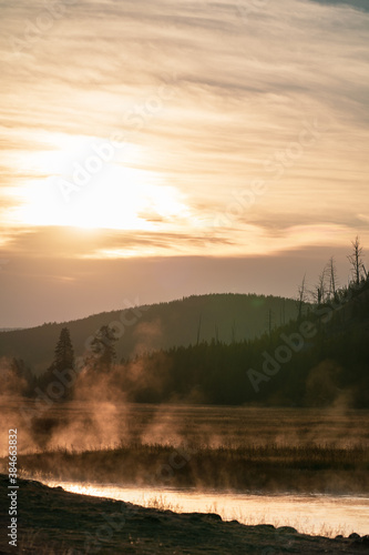 Steamy, misty morning sunrise on the Madison River in Yellowstone National Park Wyoming