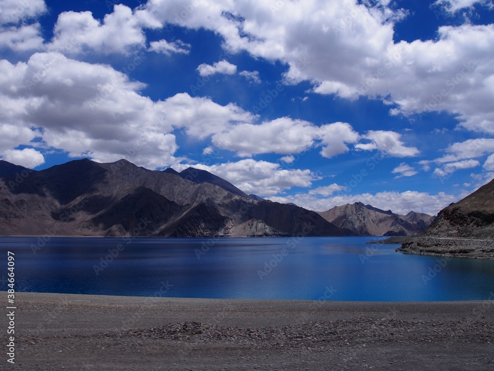 Beautiful lake and magnificent blue skies and mountains, Pangong tso (Lake), Durbuk, Leh, Ladakh, Jammu and Kashmir, India Beautiful lake and magnificent blue skies and mountains, Pangong tso (Lake), Durbuk, Leh, Ladakh, Jammu and Kashmir, India