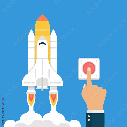 Starting New Project Concept. Businessman Hand Pressing Start Button to Launch Startup Rocket.