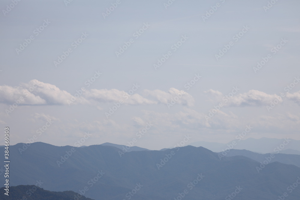 Fototapeta premium clouds over the mountains