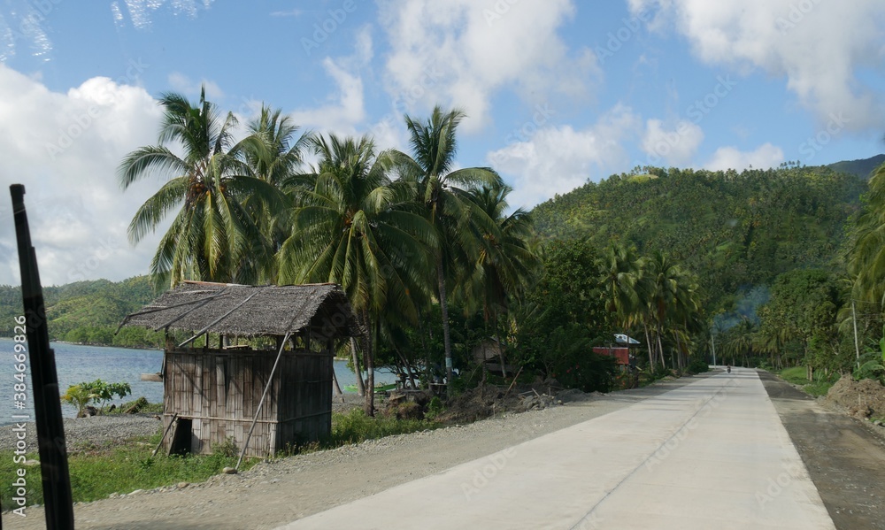Governor Generoso, Davao Oriental, Philippines-March 2016: Small huts along a coastal road in Davao Oriental.