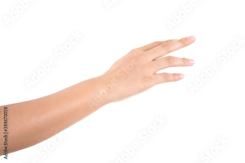 A hand gestures to grab something in front of a white background
