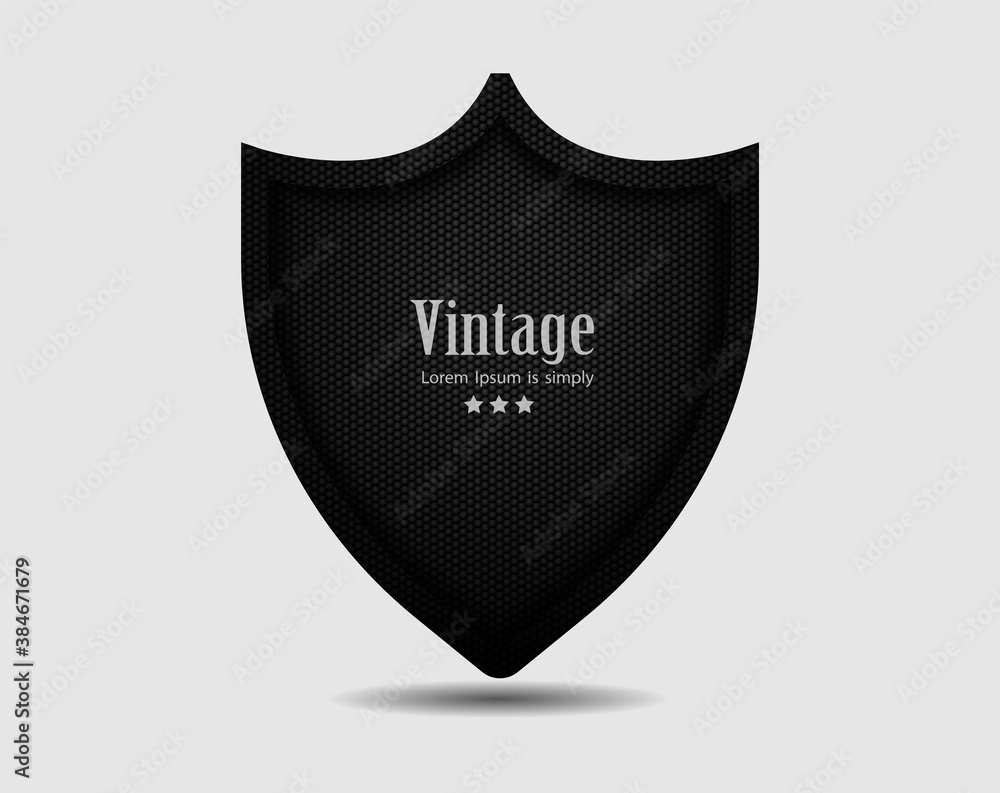 Vector metal shield with dark black Geometric grid carbon fiber texture background Vector metal shield with dark black Geometric grid carbon fiber texture background