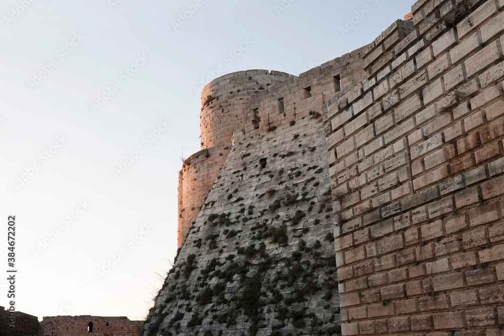 Krak des Chevaliers Crusader castle in Syria - obrazy, fototapety, plakaty 