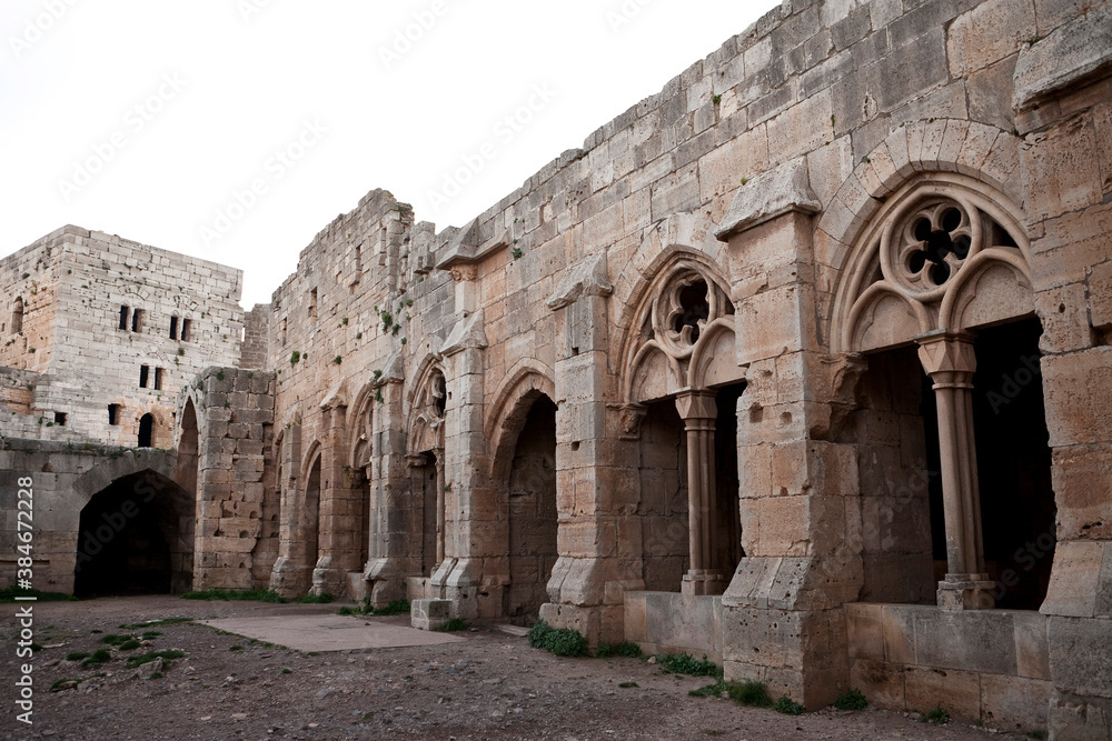 Krak des Chevaliers Crusader castle in Syria - obrazy, fototapety, plakaty 