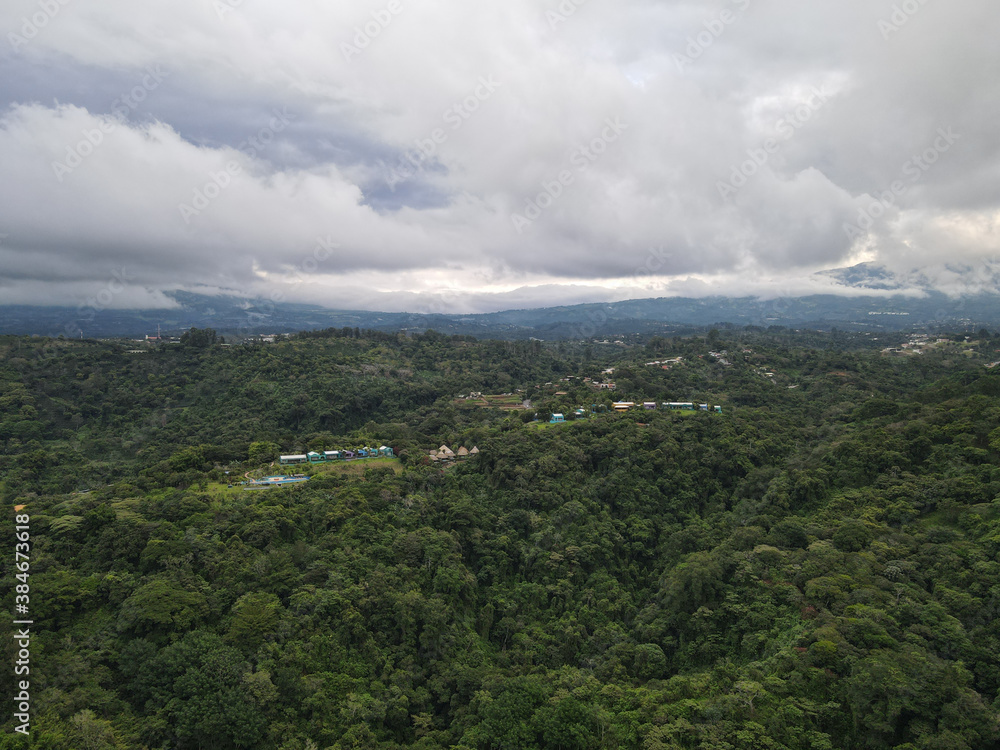 The Poetic Poas Volcano Rising over Alajuela in Costa Rica	
