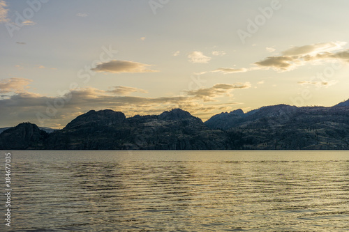 cloudy sky seen from the shore of Okanagan lake at morning British Columbia Canada