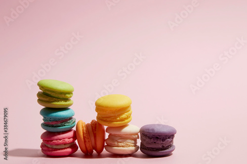 Canvas Print colourful macaroon on pastel pink background