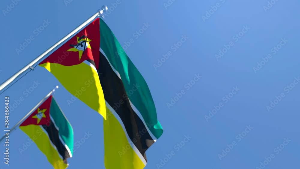 The national flag of Mozambique flutters in the wind The national flag of Mozambique flutters in the wind