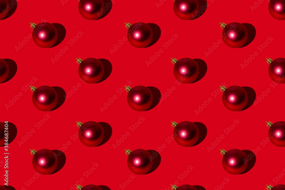 Christmas ball pattern. Red seamless background. New Year party ornament. Winter holidays adornment. Round shimmering glitter bauble symmetrical composition isolated on bright. Christmas ball pattern. Red seamless background. New Year party ornament. Winter holidays adornment. Round shimmering glitter bauble symmetrical composition isolated on bright.