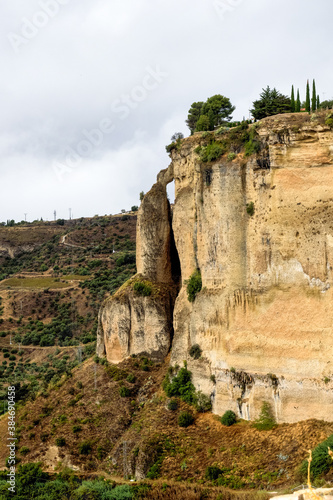 Scenic sight of Ronda with white houses built on high cliffs, Andalusia, Spain.