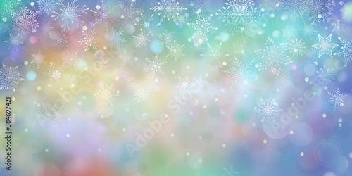 Christmas colored background of complex big and small falling snowflakes with bokeh effect