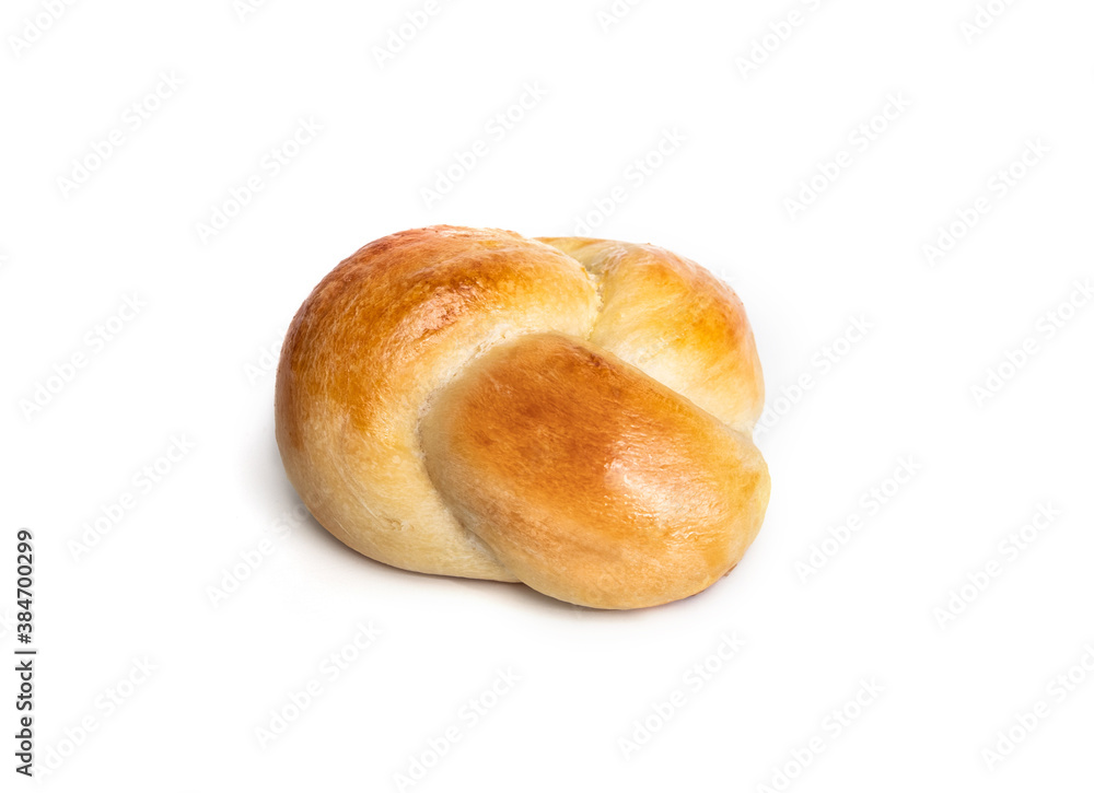 Single yeast bread bun in perspective view. One baked braided yeast knot roll with egg wash. Traditional Swiss butter bread called Zopf or Challah prepared for holiday meals. Isolated on white. Single yeast bread bun in perspective view. One baked braided yeast knot roll with egg wash. Traditional Swiss butter bread called Zopf or Challah prepared for holiday meals. Isolated on white.