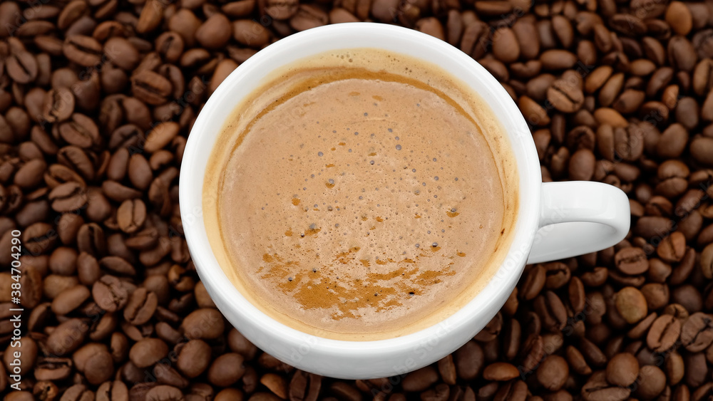 cup of black coffee with froth top view cup of black coffee with froth top view