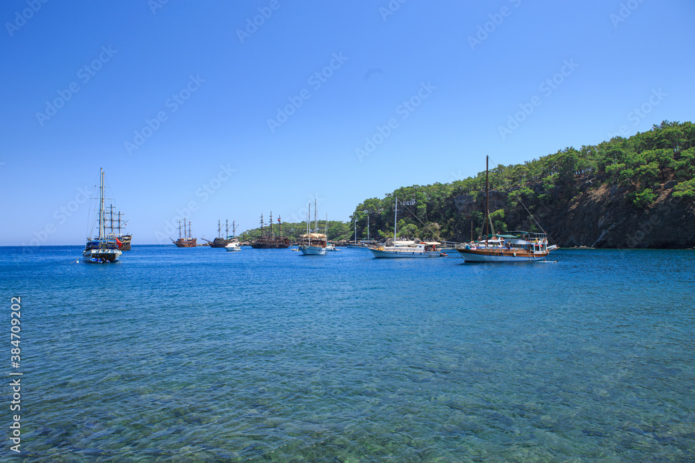 Beautiful sea bay with pleasure yachts on a summer sunny day.