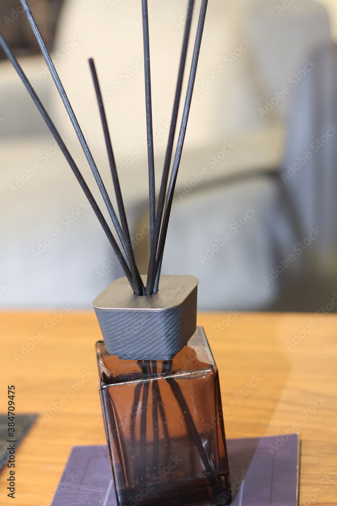 Fresh Home Fragrance Sticks. The Ritual. Home design concept. Gray background Fresh Home Fragrance Sticks. The Ritual. Home design concept. Gray background