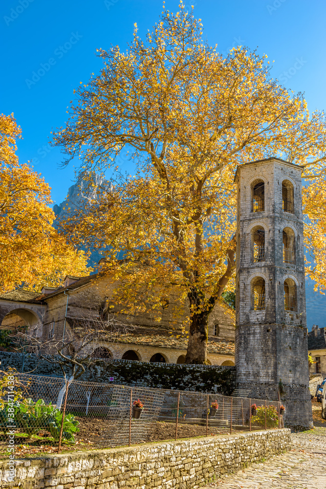The  bell tower of  Agios Vlasios (Saint Vlasios) during  fall season in the picturesque village of papigo in Epirus zagori greece