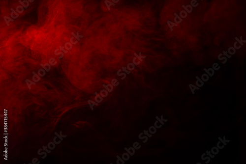 Abstract background - Red smoke on a black background