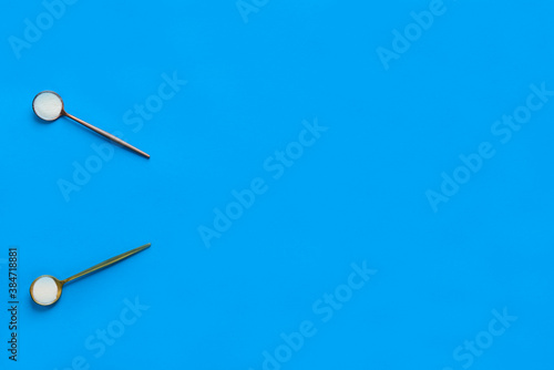 Marine collagen powder in spoons on a blue background. Dietary supplement. Horizontal orientation, top view, copy space.