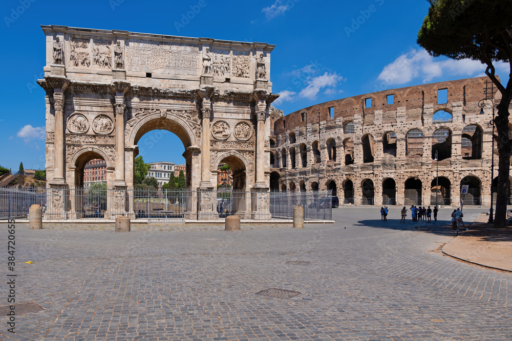 Arch of Constantine and Colosseum in city of Rome, Italy