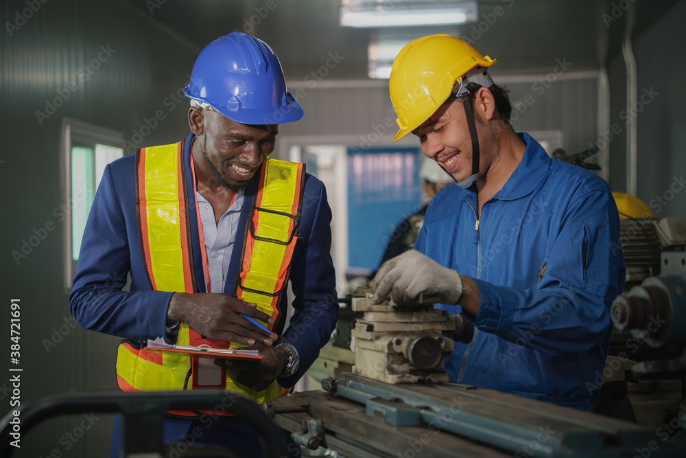 metal work factory technician inspector and worker in lathe workshop metal work factory technician inspector and worker in lathe workshop