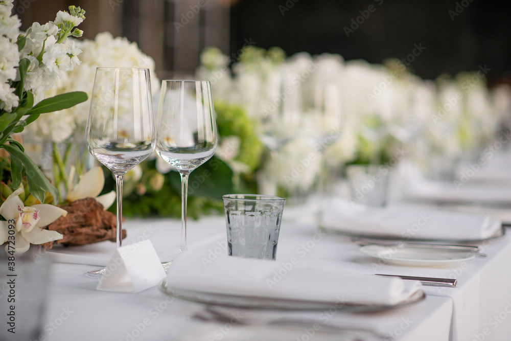empty wine glasses set up for dinner empty wine glasses set up for dinner