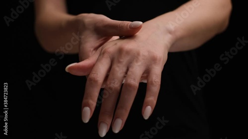 Wallpaper Mural Young woman her wrist to relieve pain. Pain relief and chronic joint arthritis concept.
 Torontodigital.ca