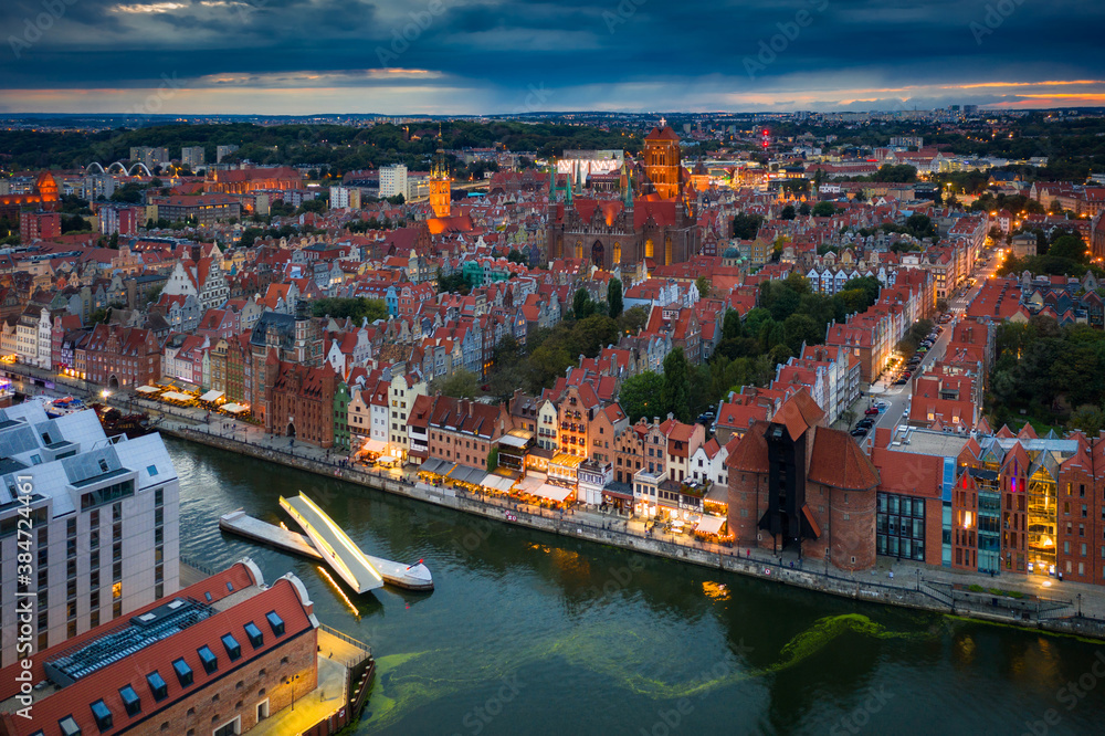 Aerial view of the Gdansk city over Motlawa river with amazing architecture at dusk, Poland