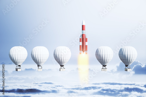 Flying white air balloons and rocket on sky background.