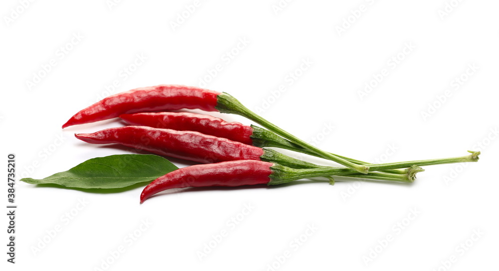 Fresh red spicy peppers, paprika with green leaf isolated on white background Fresh red spicy peppers, paprika with green leaf isolated on white background