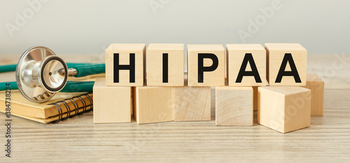 Canvas Print Wooden block form the word HIPAA - The Health Insurance Portability and Accountability Act of 1996