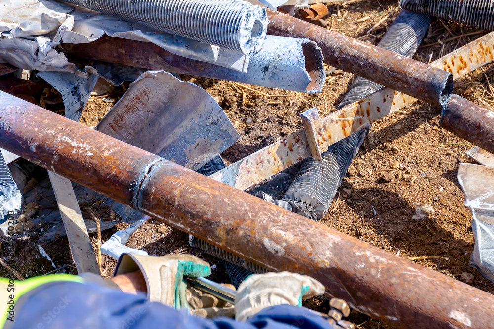 Worker is cutting scrap metal with acetylene torch Stock Photo | Adobe
