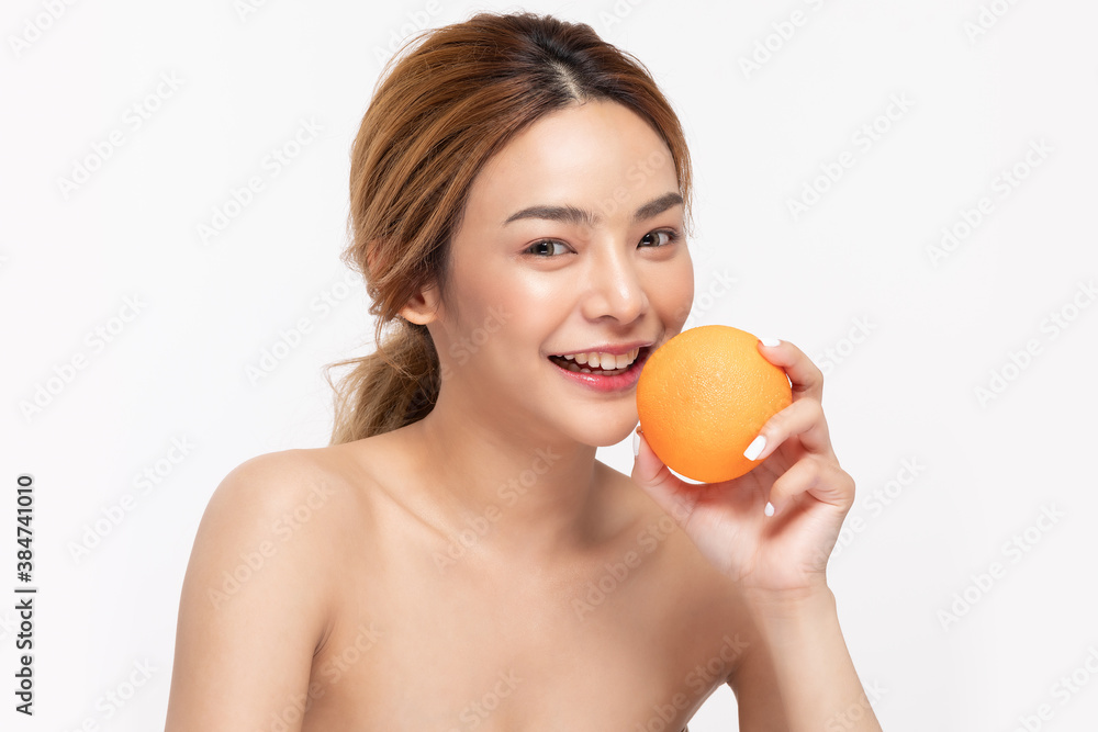 Beautiful Young Asian Woman Holding orange vitamin c smile feeling so happy and cheerful with healthy Clean and Fresh skin,isolated on white background,Beauty Cosmetics spa and treatment Concept Beautiful Young Asian Woman Holding orange vitamin c smile feeling so happy and cheerful with healthy Clean and Fresh skin,isolated on white background,Beauty Cosmetics spa and treatment Concept